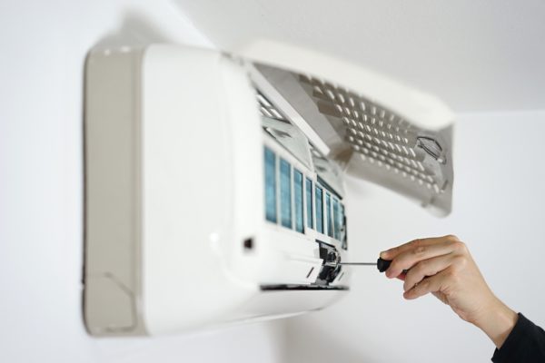 fixing and maintaining air conditioning system .
** Note: Shallow depth of field